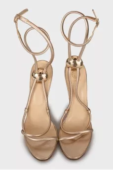 Gold leather stiletto heeled sandals