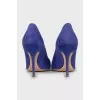 Purple suede pumps