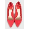 Pink suede pumps