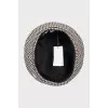 Beret in houndstooth print with tag