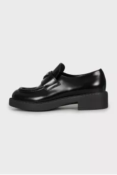 Black leather loafers