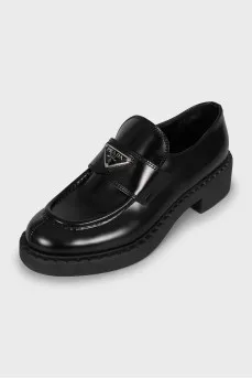 Black leather loafers