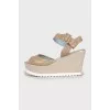 Beige leather wedge sandals