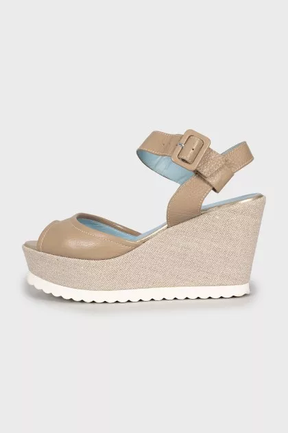 Beige leather wedge sandals