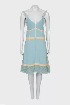 Dress with thin straps and frills