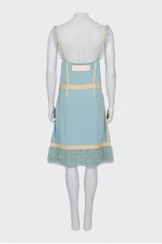 Dress with thin straps and frills