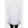 Blouse with eyelet cuffs