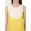Sleeveless mini dress with tag