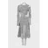 Dress with decorative slits
