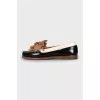 Black and white leather loafers