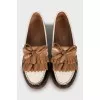 Black and white leather loafers