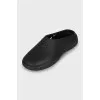 Black rubber clogs