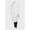 White raincoat with buttons