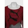 Top with logo decorated with rhinestones
