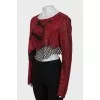 Top with logo decorated with rhinestones