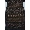 Lace dress on the floor with open shoulders