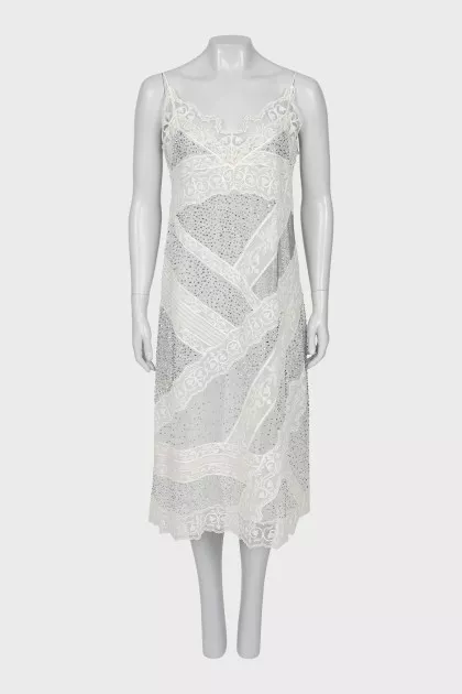 Dress decorated with embroidery and rhinestones