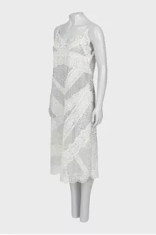 Dress decorated with embroidery and rhinestones