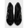 Suede shoes decorated with crystals