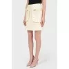 Skirt with patch pockets and frills with tag