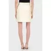 Skirt with patch pockets and frills with tag
