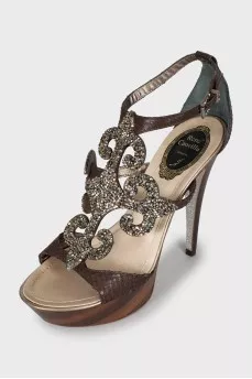 Leather sandals decorated with rhinestones