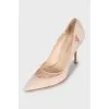 Pink suede stiletto heels