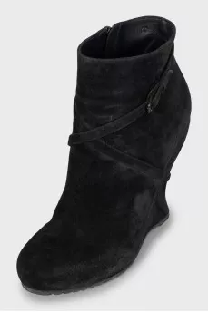 Suede ankle boots with a wedge heel and strap