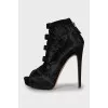 Suede ankle boots with perforation
