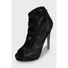 Suede ankle boots with perforation