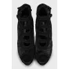Suede ankle boots with perforation