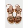 Wedge sandals with gold hardware