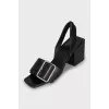 Leather sandals with a massive strap