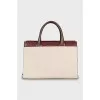 Leather bag with massive clasp