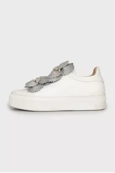 Leather sneakers decorated with rhinestones
