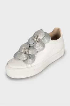 Leather sneakers decorated with rhinestones