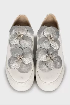 Leather sneakers decorated with rhinestones