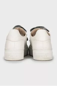 Leather sneakers decorated with rhinestones