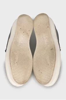 Slip-ons made of textile and leather