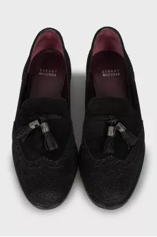 Suede loafers decorated with tassels