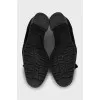 Suede loafers decorated with tassels