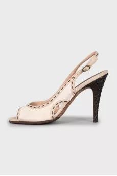 Textile sandals with weave on the heel