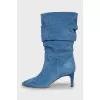 Blue suede heeled boots