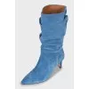 Blue suede heeled boots