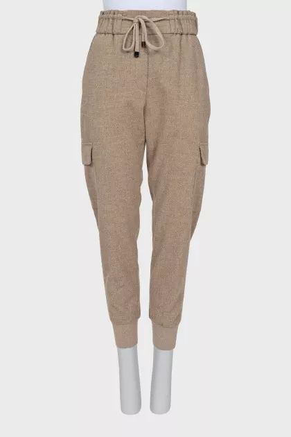 Brown trousers with patch pockets