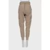 Brown trousers with patch pockets