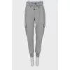 Gray trousers with patch pockets
