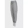 Gray trousers with patch pockets