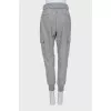 Gray trousers with patch pockets