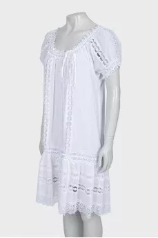 Dress with ties decorated with lace